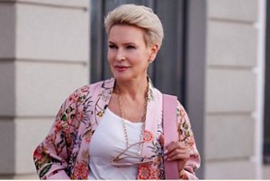 Woman with a stylish layered pixie cut