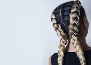 two thick braids of artificial hair, a youth hairdo, colored hai