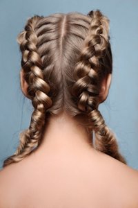 Beauty model with braids from back