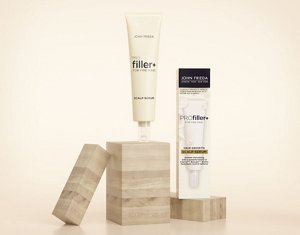 John Frieda hair serum displayed on top of wooden blocks