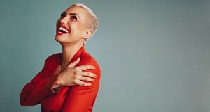 Blonde woman with a short, cropped pixie cut