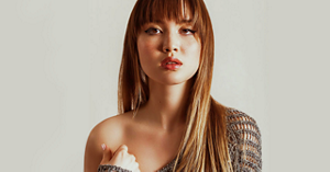 Beautiful woman with chestnut hair with a textured, layered fringe