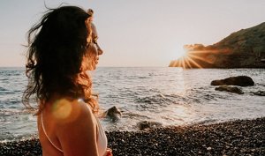 Brunette woman with mid-length styled beach waves
