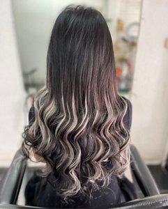 Ash blonde and platinum blonde highlights on black hair