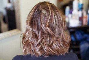 Woman with dark caramel bronde hair