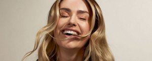Laughing woman with dark bronde hair