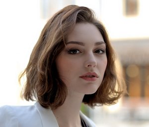 Young businesswoman with a French bob styled with a sideswept parting