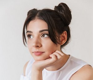 Woman with space buns hairstyle