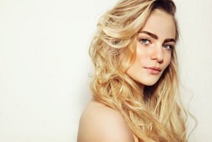Blonde woman with caramel highlights