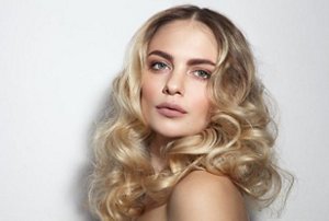 Blonde woman with warm honey highlights