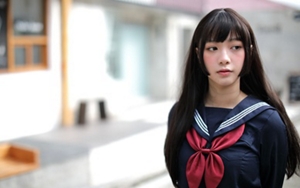 Young Asian woman with a hime haircut