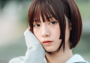 Young Japanese woman with a hime hairstyle paired with a short bob