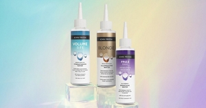 Set of John Frieda Silk Water lamellar water hair treatments against a colourful background