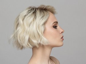 Blonde woman with a stacked bob haircut