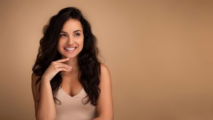 Beautiful young woman with long, wavy, frizz-free hair