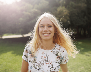 Beautiful smiling woman with light ash blonde hair