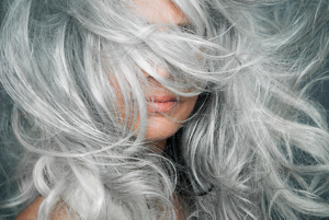 Woman with silver blonde grey hair
