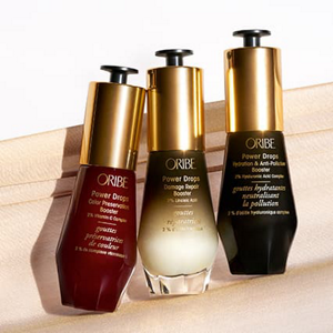 Three bottles of ORIBE Power Drops