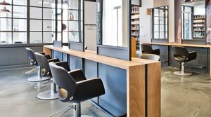 salon academy showing salon chairs and mirrors