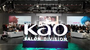 Kao Salon Division event with attendees and sign for Kao Salon