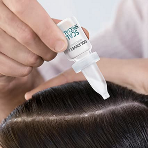 Goldwell scalp serum being put on scalp