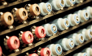 Many hair dyeing tubes in a row