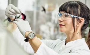 Female lab assistant with safety glasses