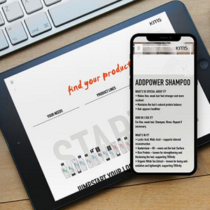 Tablet and smartphone on table showing KMS website