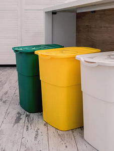 Three garbage cans in different colors