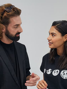 Man and young woman talking to each other